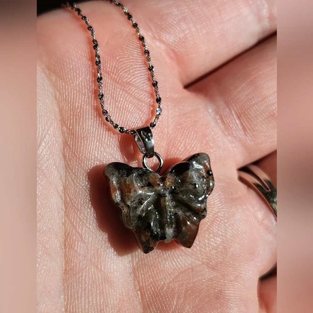 Uv Reactive Yooperlite Butterfly Pendant on a Stainless Steel Chain - Picture 3 of 6